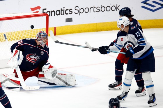 The last time these two teams faced off, the Jets won 6-2. Seen here during the Nov. 1 game, Winnipeg Jets forward Gabe Vilardi, right, watches defenceman Josh Morrissey's goal past Columbus Blue Jackets goalie Elvis Merzlikins, left, and defenseman Ivan Provorov.  (Paul Vernon / Associated Press files)
