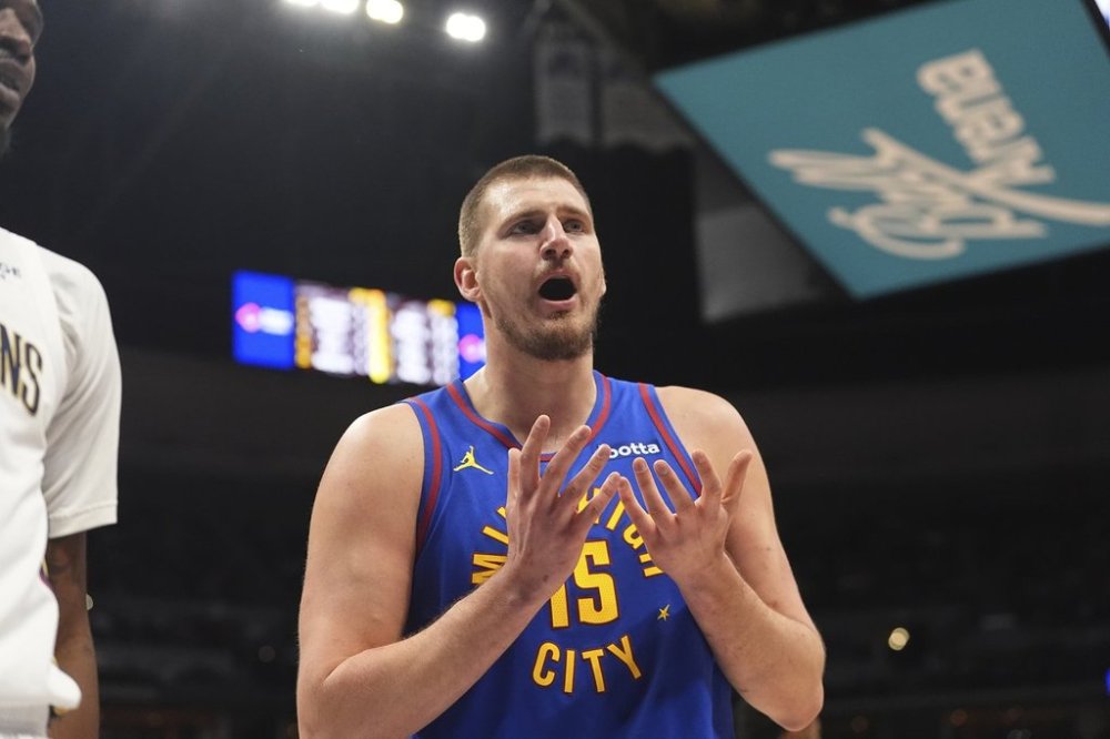 Denver Nuggets center Nikola Jokic argues for a call in the first half of an NBA basketball game against the New Orleans Pelicans, Monday, Feb. 3, 2025, in Denver. (AP Photo/David Zalubowski)