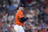 FILE - Houston Astros relief pitcher Ryan Pressly walks back onto the mound after throwing a wild pitch that allowed Detroit Tigers' Kerry Carpenter to score in the eighth inning of Game 2 of an AL Wild Card Series baseball game, Oct. 2, 2024, in Houston. (AP Photo/Kevin M. Cox, File)