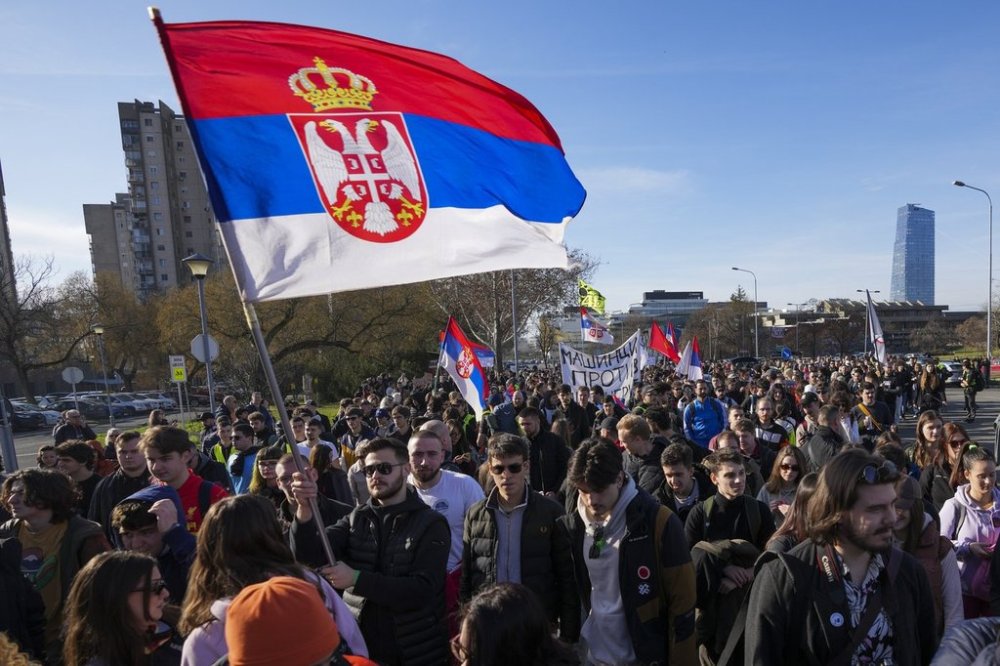 Students walk towards the northern city of Novi Sad, where they will participate in a 24 hour block of three bridges to protest the deaths of 15 people killed in the November collapse of a train station canopy, in Belgrade, Serbia, Thursday, Jan. 30, 2025. (AP Photo/Darko Vojinovic)