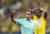 FILE - Referee Stephanie Frappart gives directions during the French Cup final soccer match between Nice and Nantes at the Stade de France stadium, in Saint Denis, north of Paris, Saturday, May 7, 2022. (AP Photo/Christophe Ena, File)