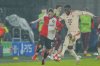 Feyenoord's Anis Hadj Moussa, left, duels for the ball with Bayern's Alphonso Davies during the Champions League opening phase soccer match between Feyenoord and Bayern Munich, at De Kuip Stadium, in Rotterdam, Netherlands, on January 22, 2025. THE CANADIAN PRESS/AP, Peter Dejong