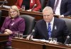 Ontario Premier Doug Ford, right, and Ontario Health Minister Sylvia Jones listen to questions from the opposition during question period at Queen's Park in Toronto on Dec. 6, 2023. The Ontario government says it is spending $1.4 billion in new money to ramp up primary health care, just two days before the premier is set to call a snap election. THE CANADIAN PRESS/Nathan Denette