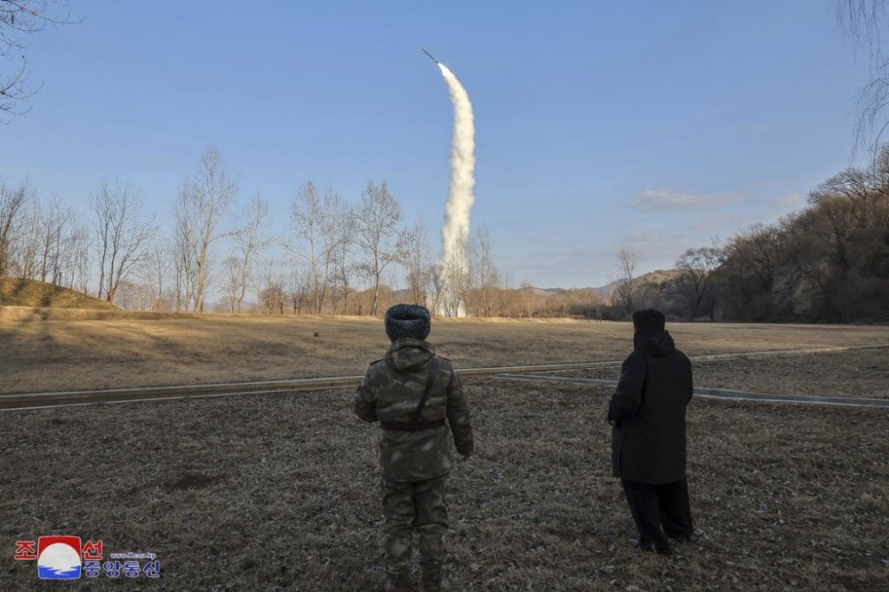 In this photo provided by the North Korean government, its leader Kim Jong Un, right, inspects testing of sea-to-surface strategic cruise guided weapons at an undisclosed location in North Korea, Saturday, Jan. 25, 2025. Independent journalists were not given access to cover the event depicted in this image distributed by the North Korean government. The content of this image is as provided and cannot be independently verified. Korean language watermark on image as provided by source reads: