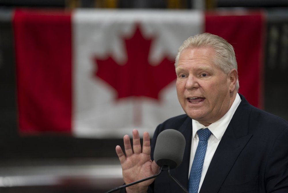 Progressive Conservative Leader Doug Ford speaks from the podium during a visit to Walker Construction in St. Catharines, Ont. on Friday, January 31, 2025. Ford says the province will rip up its $100-million contract with Elon Musk's SpaceX to deliver high-speed internet to remote areas as part of the response to U.S. tariffs. THE CANADIAN PRESS/Peter Power