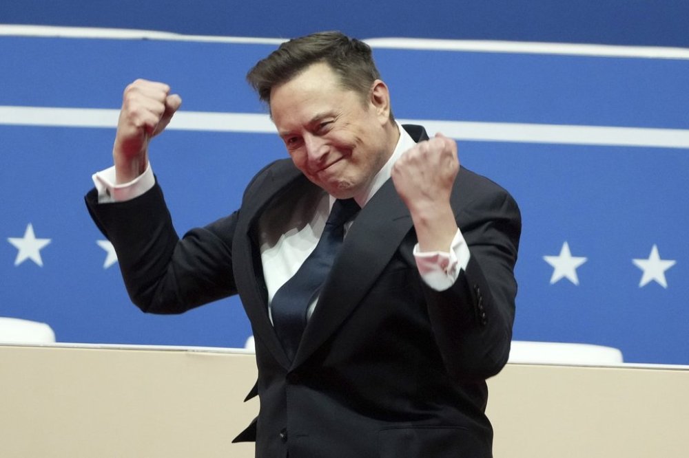 Elon Musk arrives to speak at an indoor Presidential Inauguration parade event in Washington, Monday, Jan. 20, 2025. THE CANADIAN PRESS/AP/Matt Rourke