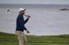 Scottie Scheffler reacts after missing a putt on the fourth hole at Pebble Beach Golf Links during the second round of the AT&T Pebble Beach Pro-Am golf tournament, Friday, Jan. 31, 2025, in Pebble Beach, Calif. (AP Photo/Nic Coury)