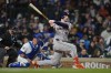 FILE - Houston Astros' Kyle Tucker watches his single during the fifth inning of the team's baseball game against the Chicago Cubs, Wednesday, April 24, 2024, in Chicago. (AP Photo/Erin Hooley, File)