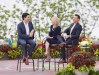 Prime Minister Justin Trudeau, left, speaks with Kelly Ripa, centre, and Ryan Seacrest during his appearance on Live with Kelly and Ryan in Niagara Falls, Ont., on June 5, 2017. THE CANADIAN PRESS/Aaron Lynett