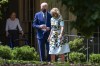 FILE - Former first lady Rosalynn Carter looks on as President Joe Biden and first lady Jill Biden leave the home of former President Jimmy Carter during a trip to mark Biden's 100th day in office, Thursday, April 29, 2021, in Plains, Ga. (AP Photo/Evan Vucci, File)