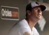 FILE - Baltimore Orioles starting pitcher Brian Matusz watches from the dugout after being removed from the baseball game against the Los Angeles Angels in the sixth inning in Baltimore, Tuesday, June 26, 2012. (AP Photo/Patrick Semansky, File)
