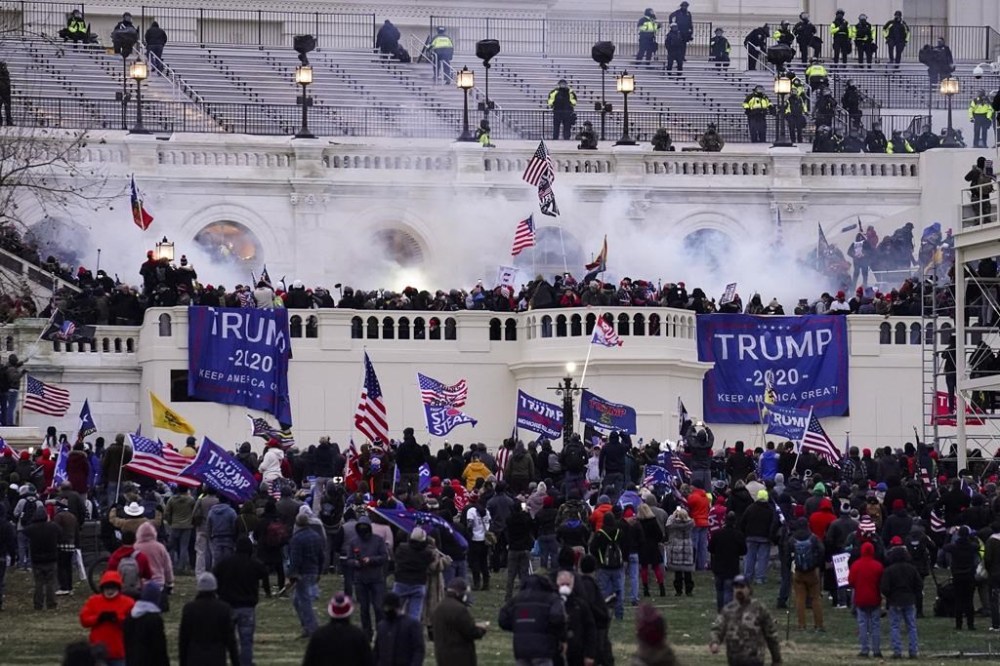 Supporters of then-President Donald Trump storm the Capitol in Washington, Jan. 6, 2021. (AP Photo/John Minchillo, File)