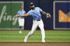 FILE -Tampa Bay Rays second baseman Amed Rosario throws to first base after fielding a ground ball during the first inning of a baseball game against the Cleveland Guardians, Sunday, July 14, 2024, in St. Petersburg, Fla. (AP Photo/Phelan M. Ebenhack, File0