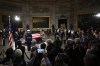 President elect Donald Trump and his wife Melania Trump visit the flag draped casket of the late former President Jimmy Carter as he lies in state at the Rotunda of the U.S. Capitol on Wednesday, Jan. 8, 2025, in Washington. (AP Photo/John McDonnell)