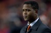 FILE - Assistant coach Patrick Kluivert of the Netherlands watches players ahead of a Group D World Cup qualifying soccer match against Estonia in Amsterdam, Netherlands, March 22, 2013. (AP Photo/Peter Dejong, File)