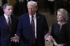 President-elect Donald Trump, flanked by Sen. John Barrasso, R-Wyo., left, Sen. Shelley Moore Capito, R-W.Va., right, talks to reporters after a meeting with Republican leadership at the Capitol on Wednesday, Jan. 8, 2025, in Washington. THE CANADIAN PRESS/AP-Steve Helber