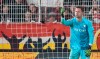FILE - Bochum goalkeeper Patrick Drewes shows an object with which he was hit on the head during a Bundesliga soccer match between FC Union Berlin and VfL Bochum, Saturday, Dec. 14, 2024, in Berlin. (Andreas Gora/dpa via AP, File)