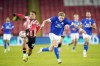 Sheffield United's Ryan One, left, and Cardiff City's Jesper Daland battle for the ball during the English FA Cup third round soccer match between Sheffield United and Cardiff City at Bramall Lane, Sheffield, England, Thursday Jan. 9, 2025. (Danny Lawson/PA via AP)