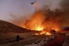 A Quebec water bomber fighting the wildfires in the Los Angeles area was grounded after it collided with a drone flying in the area on Thursday.Fire crews battle the Kenneth Fire in the West Hills section of Los Angeles, Thursday, Jan. 9, 2025. THE CANADIAN PRESS/AP/Ethan Swope