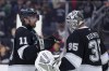 Los Angeles Kings center Anze Kopitar, left, speaks with goaltender Darcy Kuemper after the team's win against the New Jersey Devils during an NHL hockey game, Wednesday, Jan. 1, 2025, in Los Angeles. THE CANADIAN PRESS/AP-Ryan Sun