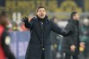Leverkusen's head coach Xabi Alonso reacts during the German Bundesliga soccer match between Borussia Dortmund and Bayer Leverkusen at the Signal-Iduna Park in Dortmund, Germany, Friday, Jan. 10, 2025. (AP Photo/Martin Meissner)
