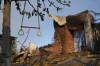 A swing hangs from a tree in front of a fire-damaged residence in the aftermath of the Palisades Fire in the Pacific Palisades neighborhood of Los Angeles, Friday, Jan. 10, 2025. THE CANADIAN PRESS/AP-Eric Thayer