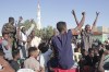 People celebrate following the reports that, Sudan's army had entered the central city of Wad Madani and pushed out its paramilitary rivals the Rapid Support Forces (RSF), in Merowe, Sudan, Saturday, Jan.11, 2025. (AP Photo/Marwan Ali)
