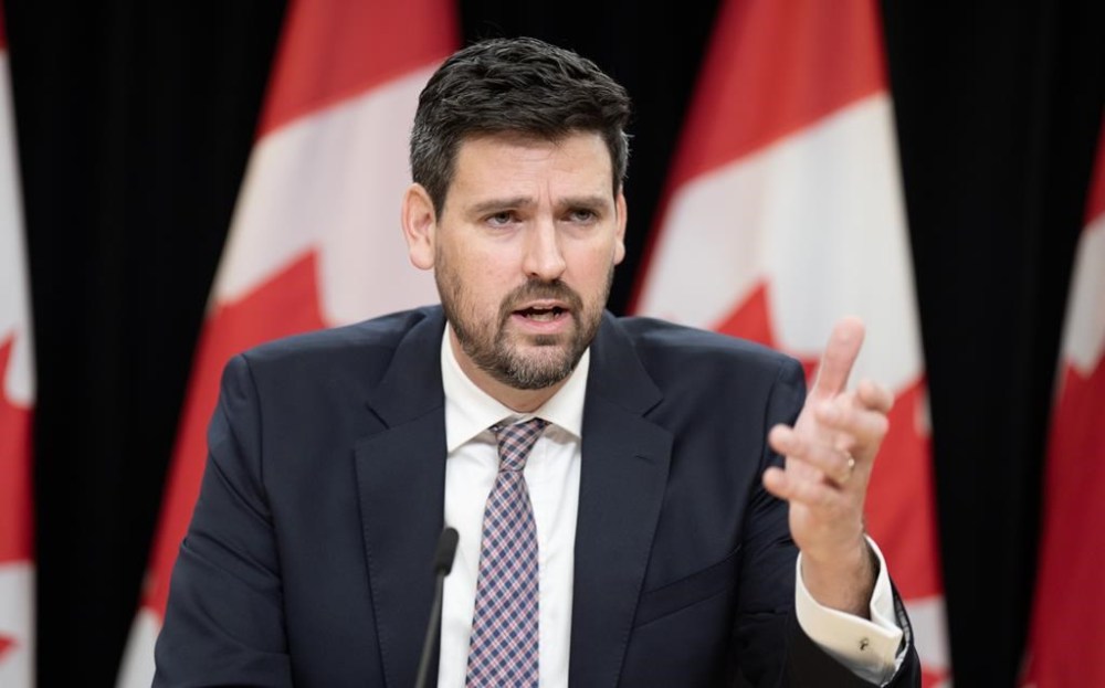 Sean Fraser responds to a question from the media after announcing he is leaving federal politics, Monday, Dec. 16, 2024 in Ottawa. THE CANADIAN PRESS/Adrian Wyld