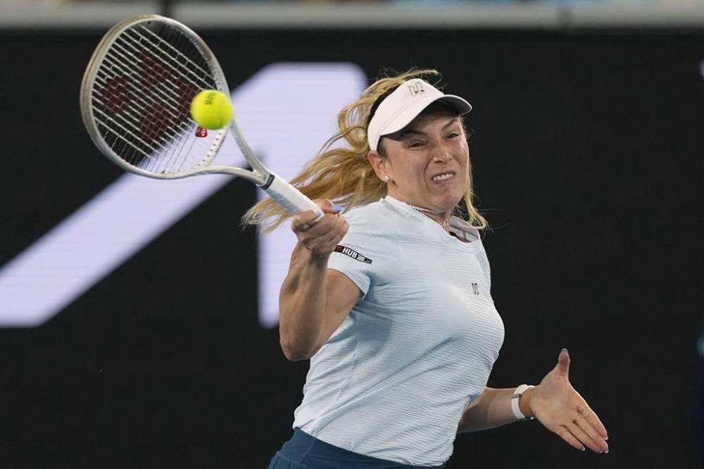 Donna Vekic of Croatia plays a forehand return to Diane Parry of France during their first round match at the Australian Open tennis championship in Melbourne, Australia, Sunday, Jan. 12, 2025. (AP Photo/Asanka Brendon Ratnayake)
