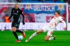 Leipzig's Lukas Klostermann, right and Werder's Marvin Ducksch vie for the ball, during the German Bundesliga soccer match between RB Leipzig and SV Werder Bremen, in Leipzig, Germany, Sunday, Jan. 12, 2025. (Jan Woitas/dpa via AP)