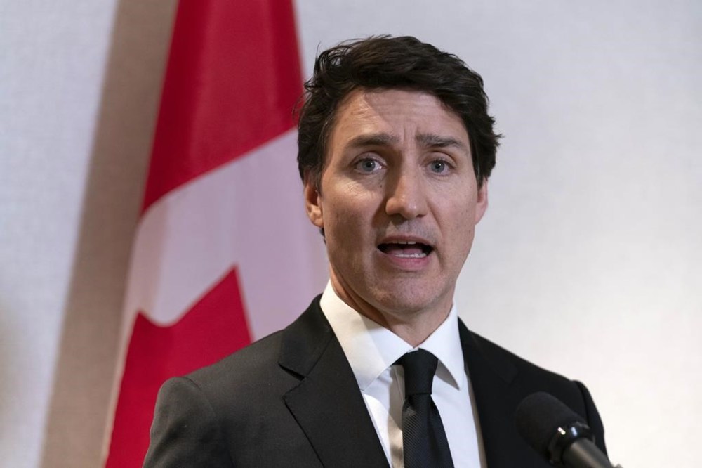Canada's Prime Minister Justin Trudeau speaks to the media after a meeting with Jay Timmons, president and CEO of The National Association of Manufacturers, in Washington, Thursday, Jan. 9, 2025. THE CANADIAN PRESS/AP-Jose Luis Magana