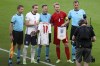 FILE - England's Harry Kane, 2nd left, hands to Denmark's Simon Kjaer an English shirt with the name of Denmark's Christian Eriksen before the Euro 2020 soccer championship semifinal match between England and Denmark at Wembley stadium in London, Wednesday, July 7, 2021. (Catherine Ivill/Pool Photo via AP, File)