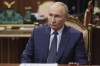 Russian President Vladimir Putin listens to the CEO of the Russian Direct Investment Fund Kirill Dmitriev during their meeting at the Kremlin in Moscow, Russia, Monday, Jan. 13, 2025. (Alexander Kazakov, Sputnik, Kremlin Pool Photo via AP)