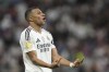 Real Madrid's Kylian Mbappe reacts during the Spain Super Cup final soccer match between Real Madrid and Barcelona at King Abdullah Stadium in Jeddah, Saudi Arabia, Sunday, Jan. 12, 2025. (AP Photo/Altaf Qadri)