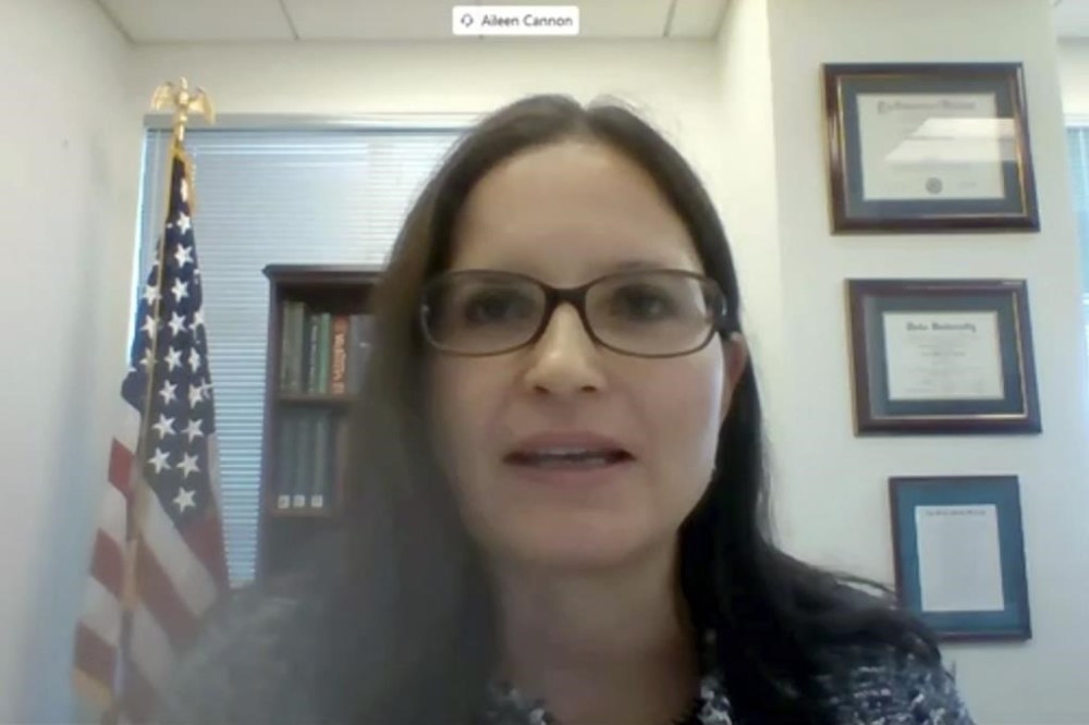 FILE - In this image from video provided by the U.S. Senate, Aileen M. Cannon speaks remotely during a Senate Judiciary Committee oversight nomination hearing to be U.S. District Court judge for the Southern District of Florida on July 29, 2020, in Washington. U.S. District Judge Aileen Cannon said Monday the Justice Department can publicly release its investigative report on President-elect Donald Trump's 2020 election interference case, but a temporary injunction barring the immediate release of the report remains in effect until Tuesday. Defense lawyers may seek to challenge it all the way up to the Supreme Court. (U.S. Senate via AP)