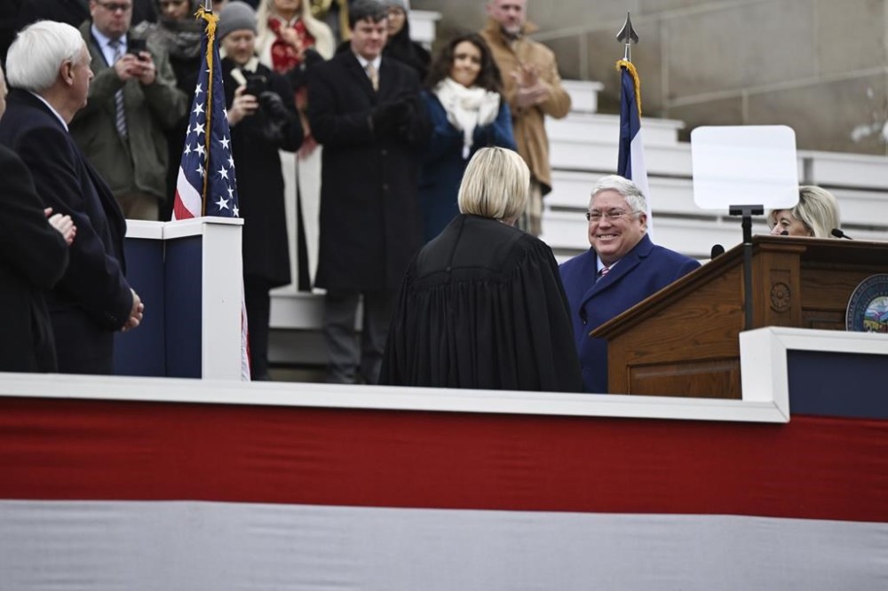 Patrick Morrisey is sworn in as West Virginia Governor at the state capitol in Charleston, W.Va., on Monday, Jan. 13, 2025. (AP Photo/Chris Jackson)