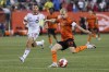 Toronto FC defender Kobe Franklin (19) looks on as Forge FC midfielder Kyle Bekker (10) takes a shot during second half Canadian Championship semifinal action in Hamilton, Ont., on Wednesday, July 10, 2024. THE CANADIAN PRESS/Nick Iwanyshyn