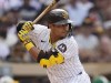 FILE - San Diego Padres' Donovan Solano bats against the Houston Astros during a baseball game Sept. 18, 2024, in San Diego. (AP Photo/Gregory Bull. File)