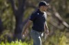 Xander Schauffele looks towards the gallery after his shot on the fourth green during the first round of The Sentry golf event, Thursday, Jan. 2, 2025, at Kapalua Plantation Course in Kapalua, Hawaii. (AP Photo/Matt York)