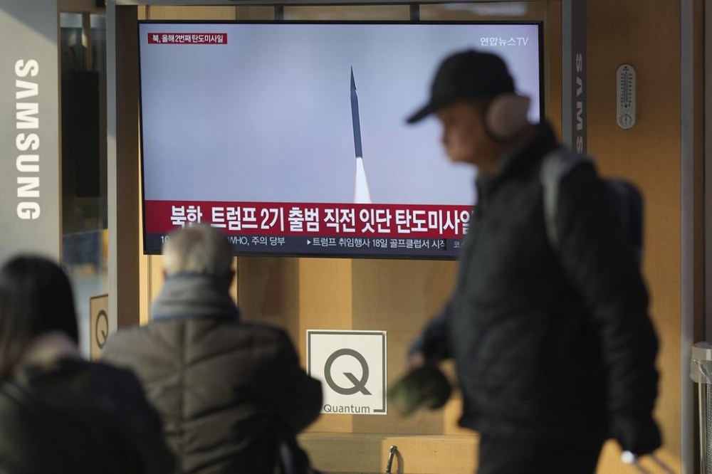 A TV screen shows a report of North Korea's missiles launch with file footage during a news program at the Seoul Railway Station in Seoul, South Korea, Tuesday, Jan. 14, 2025. (AP Photo/Lee Jin-man)