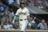 FILE - Seattle Mariners' Josh Rojas walks off the field after an at-bat during a baseball game against the Los Angeles Angels, July 23, 2024, in Seattle. (AP Photo/Stephen Brashear, file)