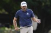 Keegan Bradley lines up his shot on the first hole during the final round of the Sony Open golf event, Sunday, Jan. 12, 2025, at Waialae Country Club in Honolulu. (AP Photo/Matt York)