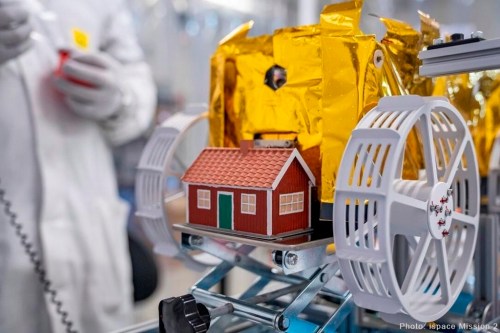 This photo provide by The Moonhouse project and taken in September 2024 at the ispace facilities in Japan, shows a little red model house created by artist Mikael Genberg and scheduled to launched into space on a Falcon 9 rocket from Cape Canaveral in Florida on Wednesday, Jan. 15, 2025. (ispace mission 2 via AP)