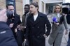 Chelsea striker Sam Kerr outside Kingston Crown Court, south west London, Tuesday Jan. 14, 2025, following a hearing where she is charged with alleged racially aggravated harassment of a police officer. (Andrew Matthews/PA via AP)