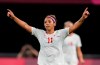 Canada's Desiree Scott celebrates at the end of a women's soccer match against Chile at the 2020 Summer Olympics, Saturday, July 24, 2021, in Sapporo, Japan. Canada won 2-1. (AP Photo/Silvia Izquierdo)