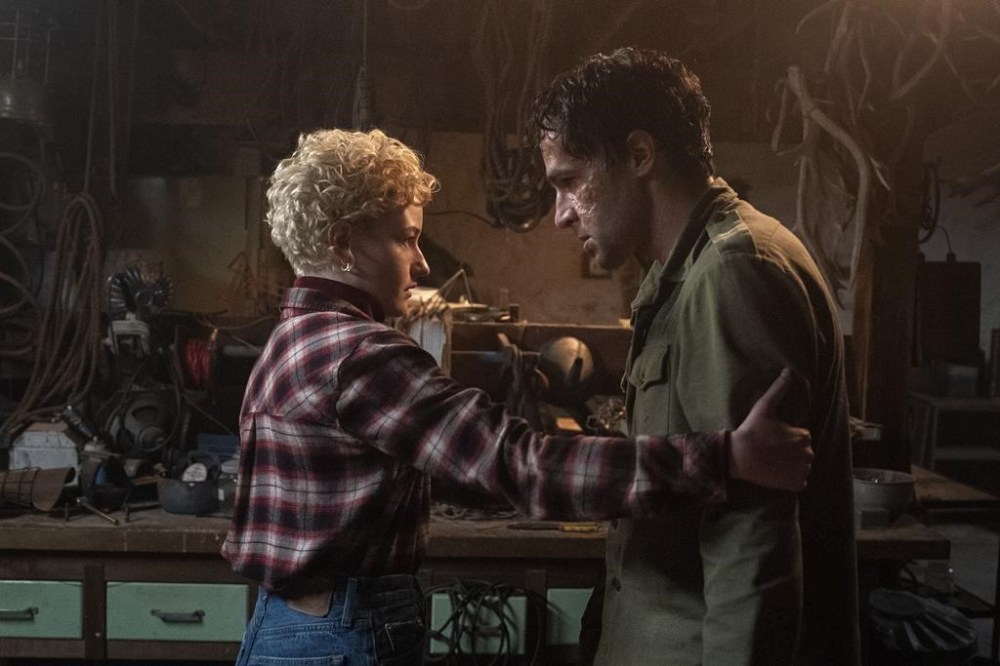 This image released by Universal Pictures shows Julia Garner, left, and Christopher Abbott in a scene from