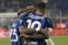 Inter Milan's Lautaro Martinez, front, celebrates with his teammate Inter Milan's Marcus Thuram after scoring during a Serie A soccer match between Inter Milan and Bologna the San Siro stadium in Milan, Italy, Wednesday, Jan. 15, 2025. (AP Photo/Luca Bruno)