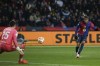 Barcelona's Lamine Yamal, right, scores his side's fifth goal during a Spanish Copa del Rey round of 16 soccer match between Barcelona and Real Betis at the Lluis Companys Olympic Stadium in Barcelona, Spain, Wednesday, Jan. 15, 2025. (AP Photo/Joan Monfort)