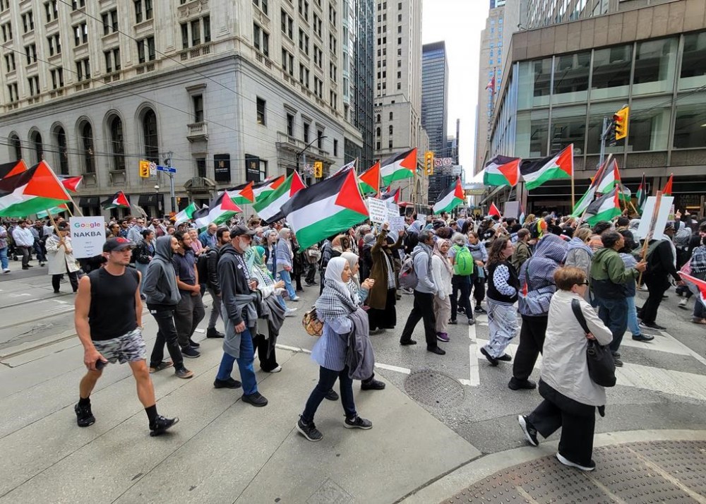 People take part in a pro-Palestinian protest in Toronto on Saturday Sept. 7, 2024.THE CANADIAN PRESS/Doug Ives