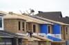 Canada Mortgage and Housing Corp. says the total number of housing starts in 2024 rose two per cent compared with 2023, helped by increased starts in Alberta, Quebec and the Atlantic provinces. New homes are constructed in Ottawa on Monday, Aug. 14, 2023. THE CANADIAN PRESS/Sean Kilpatrick